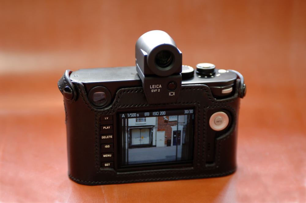   The M240 Classic Case retains the leather protection around the screen and controls but allows for the fitting of the EVF-2 viewfinder. Most other case manufacturers provide the open design which lack the cross members which, as Paul says, help ensure a close fit.  